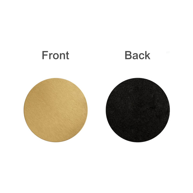 A round metal coaster featuring a gold front and a black back, with a logo present.