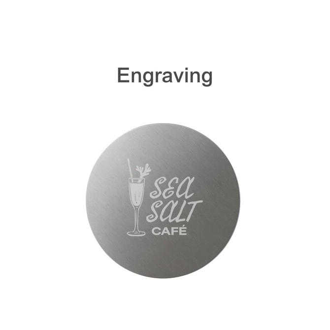 A round metal coaster with a brushed silver finish and a logo engraved on it.