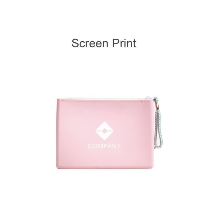 A pink silicone cosmetic pouch with a zip closure and a logo on the front.
