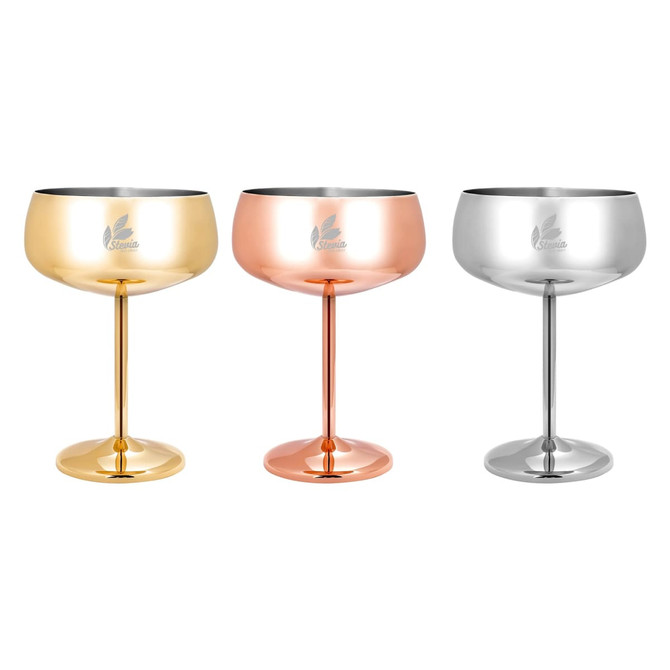 A set of three stainless steel cocktail coupes in gold, rose gold, and silver finishes, each with a pedestal base.