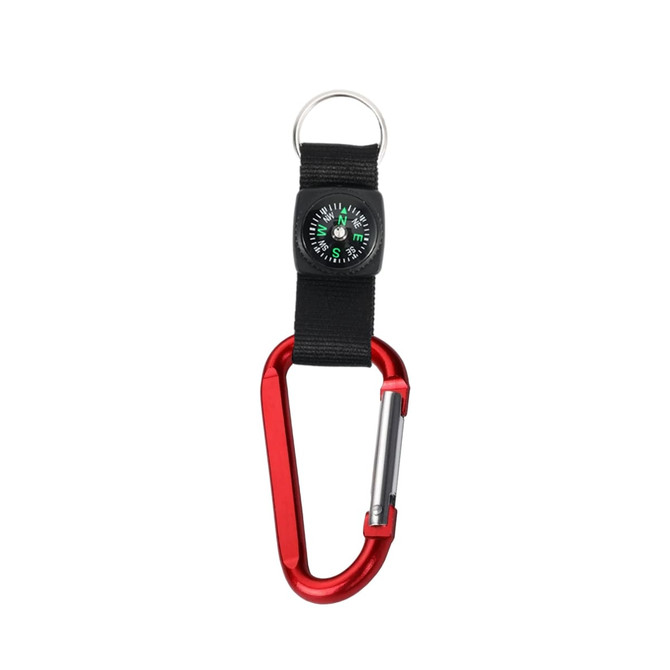 A red carabiner keychain with a black strap and a small green compass attached. It features a metallic finish.