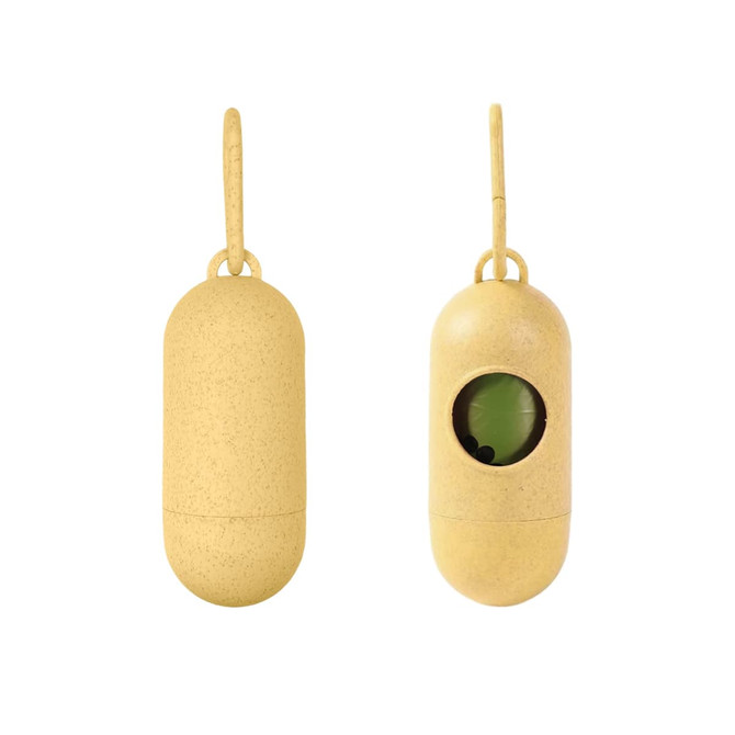 A yellow eco-friendly pill-shaped pet waste bag dispenser with a viewing window and a hanging loop.