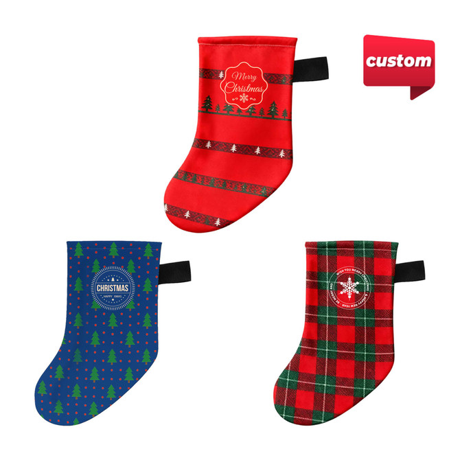 A set of three Christmas stockings, featuring red, green, and blue designs with various festive patterns and logos.