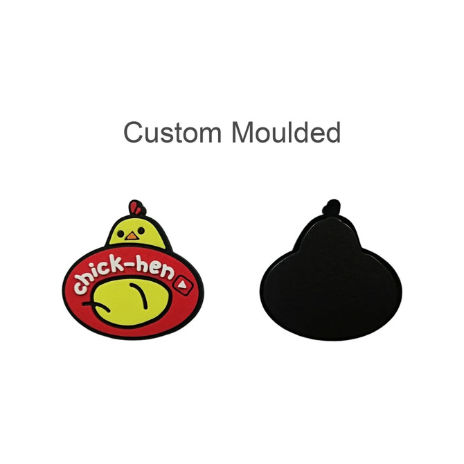 A custom moulded PVC fridge magnet featuring a cartoon chicken design, with bright colours including red, yellow, and black.