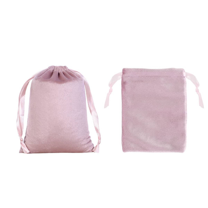 A set of silk velvet drawstring bags in a soft pink hue, featuring a smooth texture and matching ribbon ties.