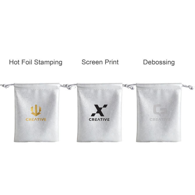 Three white PU leather drawstring gift bags, each featuring different logo printing styles: hot foil stamping, screen print, and debossing.