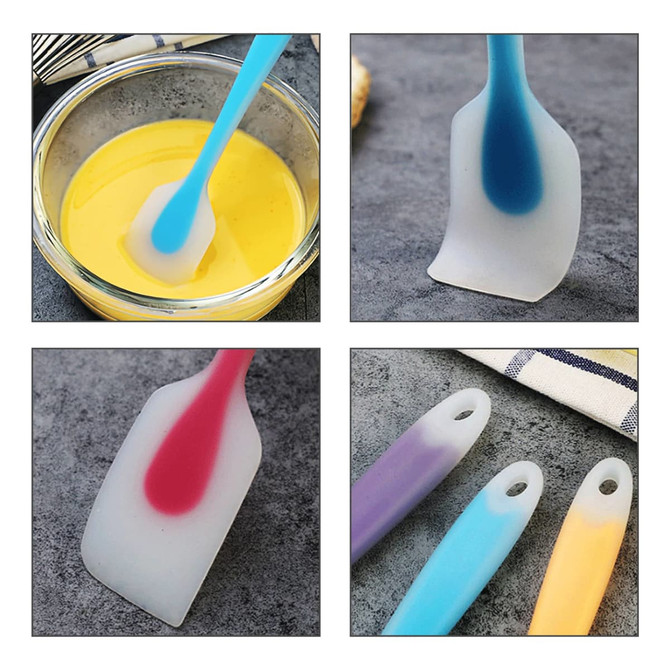 Silicone spatulas in various colours, including blue, pink, and purple, displayed with food and on a countertop.