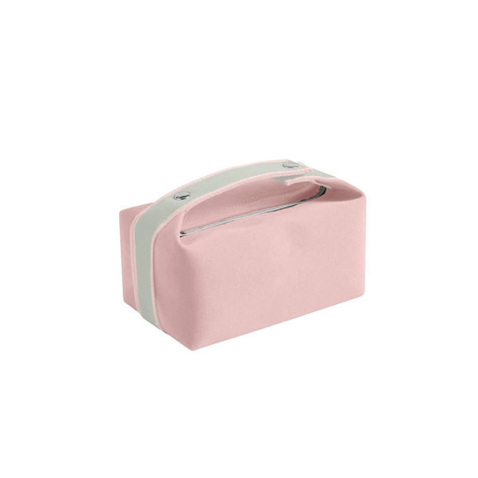 A pink portable canvas cosmetic bag with a grey handle and silver zipper. Features a simple design and a brand logo.