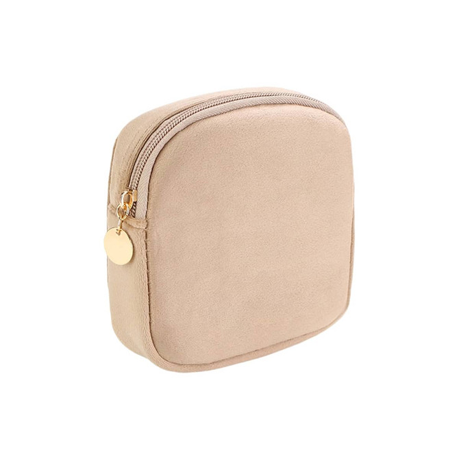 A stylish mini makeup bag in soft beige with a gold zipper and a round zipper pull. It features a simple, sleek design.