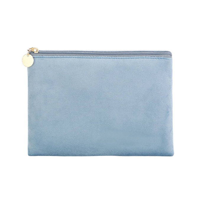 A durable flat makeup bag in a soft blue colour, featuring a gold zipper and a small charm.