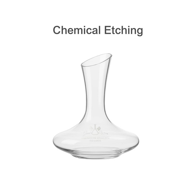 A glass wine decanter with a curved body and a tall neck, featuring a logo etched on the surface.