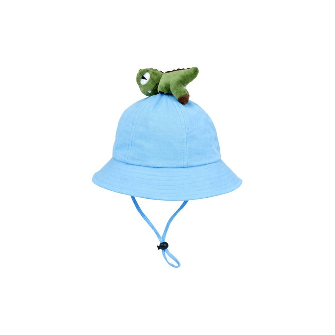 A blue bucket hat featuring a plush dinosaur on top and an adjustable chin strap.