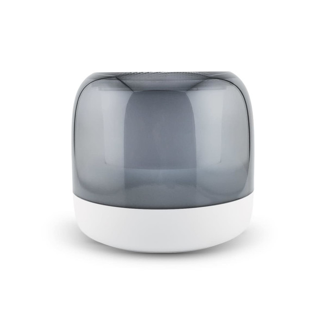 A rounded speaker with a smoke grey top and a white base, featuring a modern design and smooth surface.