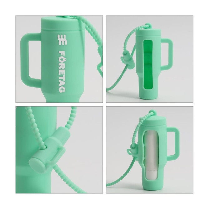 A mint green lip balm holder keychain with a handle and a transparent section, featuring a logo.