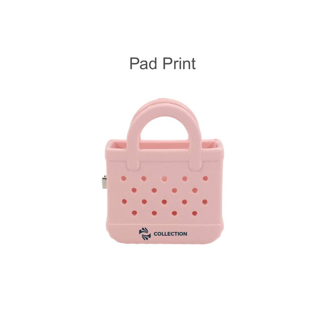 A pink mini EVA bag clip with a handle and perforated design, featuring a logo on the base.