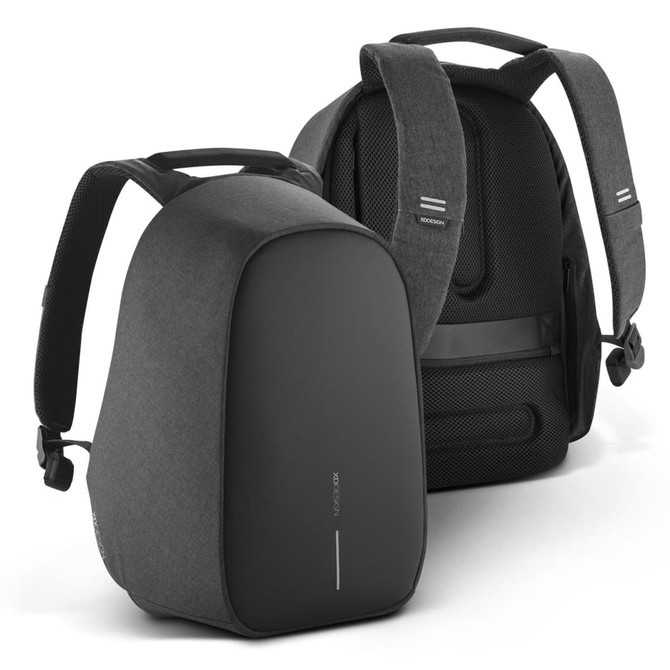 A grey backpack with a sleek design, featuring adjustable straps and a padded back for comfort.