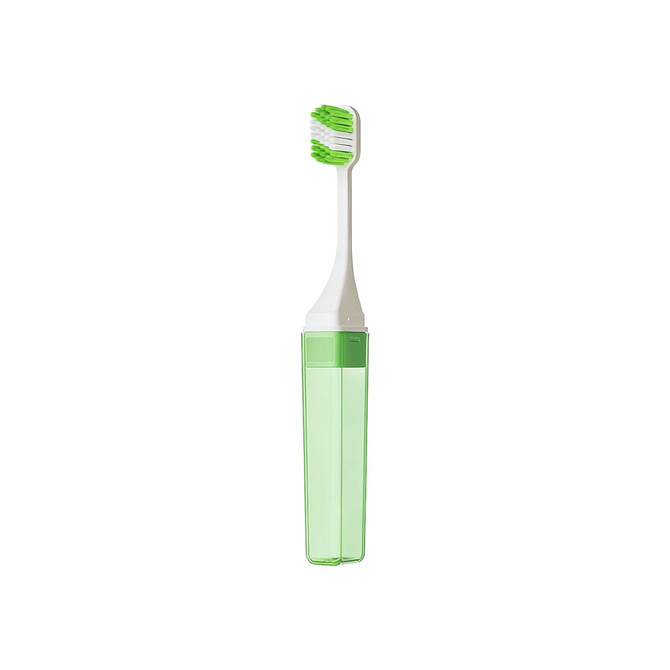A green foldable toothbrush with a white handle, stored in a clear green case, featuring a logo.