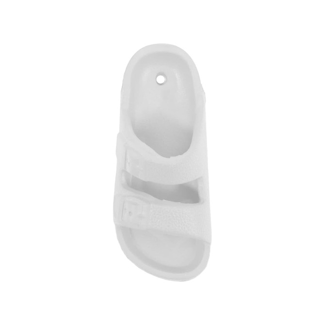 A white, sandal-shaped fridge magnet with buckle details and a hole for hanging.
