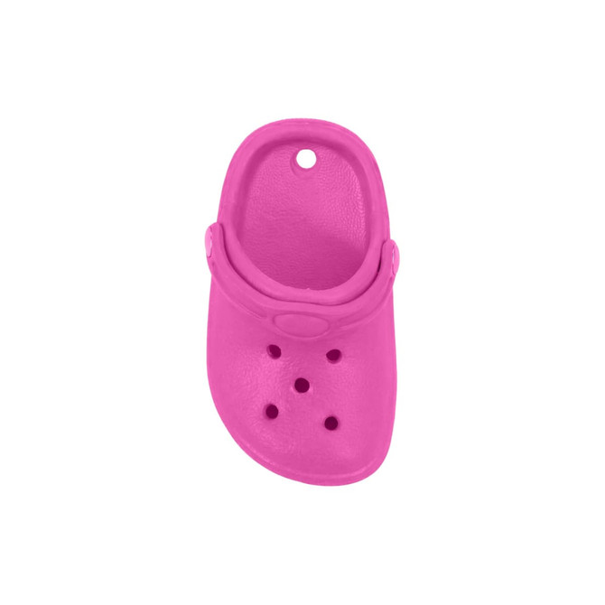 A bright pink clog shoe fridge magnet with ventilation holes and a strap detail. It has a simple, smooth design.