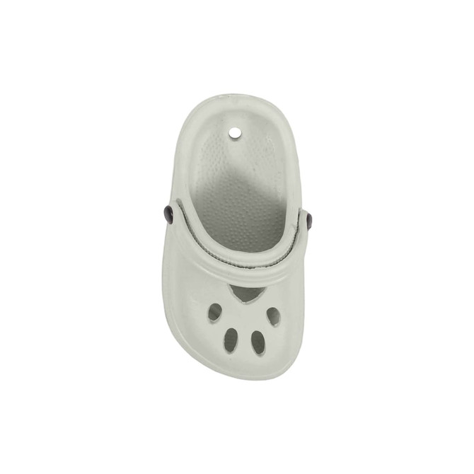 A grey shoe-shaped charm with ventilation holes and a strap, featuring a circular hole at the top.