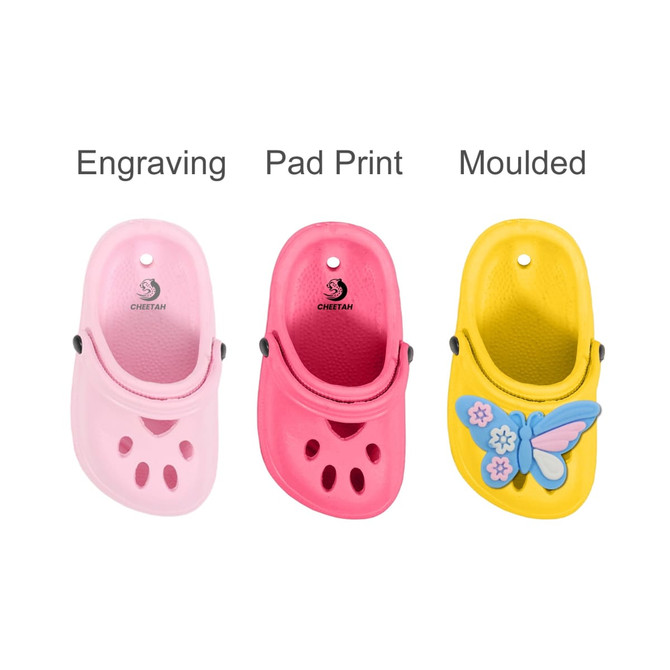Three paw clog shoe-shaped charms in pink, light pink, and yellow with a butterfly design. Each has a moulded, engraved, or printed finish.