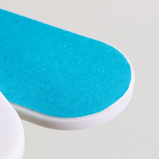 A foldable nail file block featuring a turquoise surface and a white base.