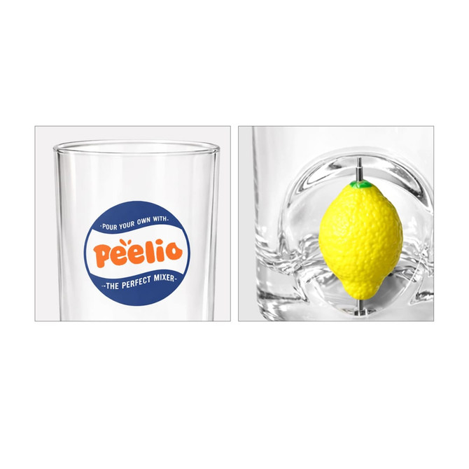 A glass cup with a yellow lemon-shaped spinner toy inside and a circular logo. Clear glass with a vibrant colour.