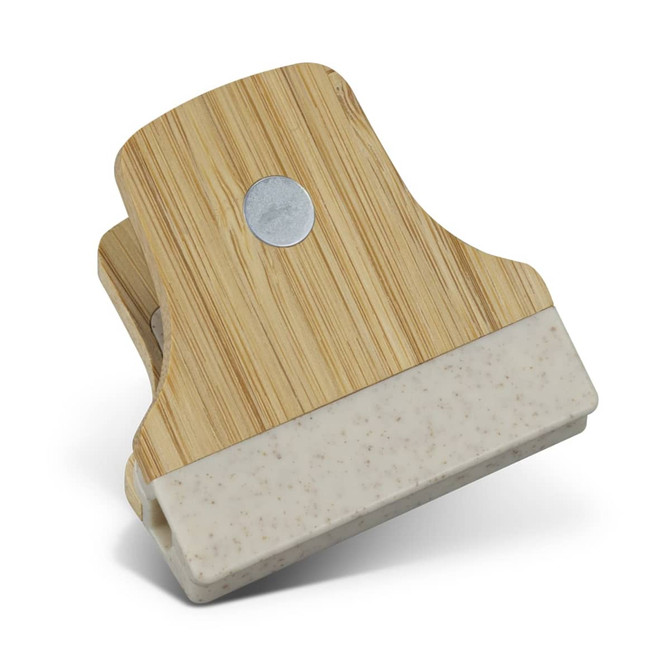 A bamboo clip featuring a natural wood finish with a white base, showcasing a round metal accent.