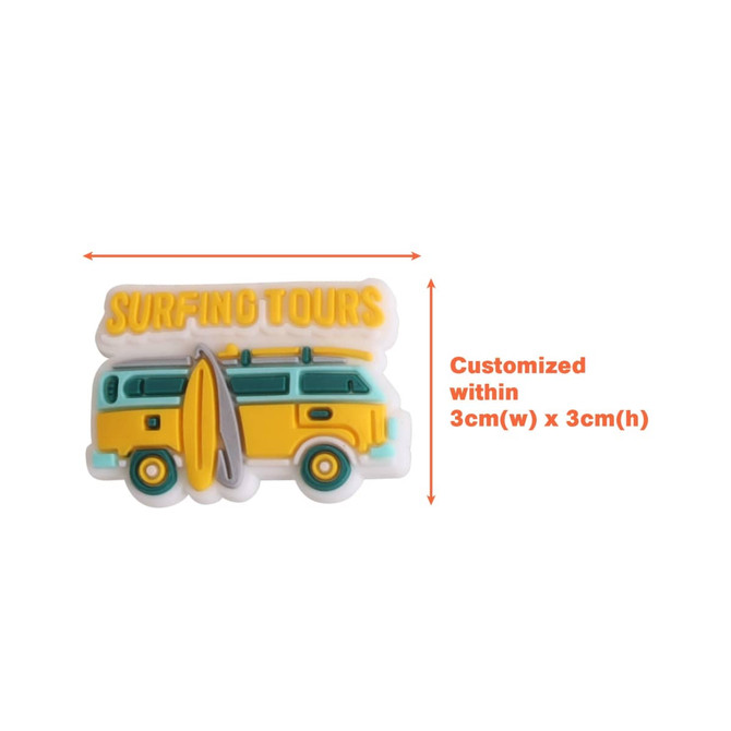 A yellow and green Clog Shoe Charm in the shape of a van with a surfboard and text above it.
