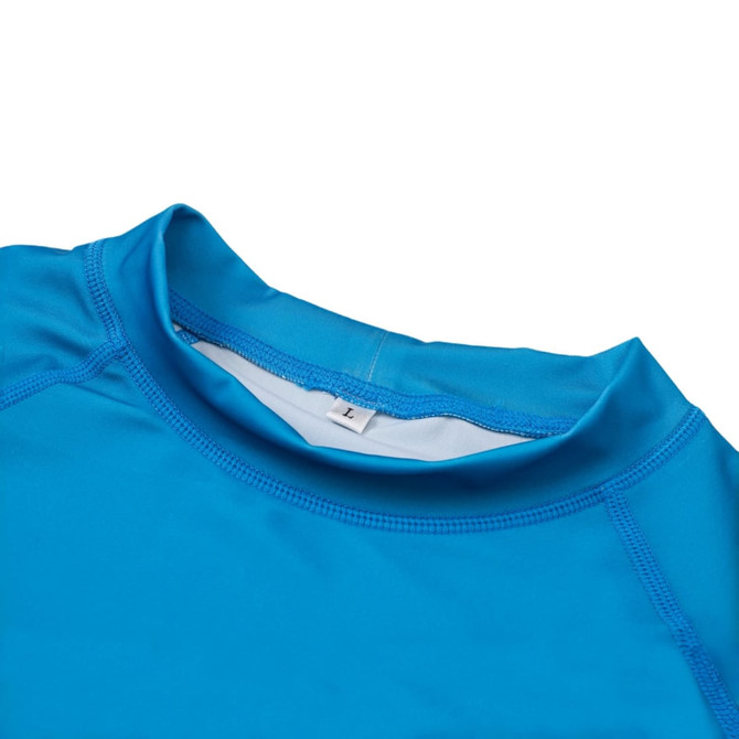 A bright blue UPF 50+ rashie featuring long sleeves and a high collar, with a tag visible inside.