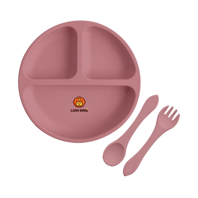 A silicone kids suction plate in a soft pink colour, featuring three compartments and accompanied by a spoon and fork.