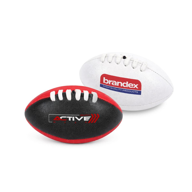 A mini Aussie rules ball in black and red, with one side featuring a logo and the other in white with branding.