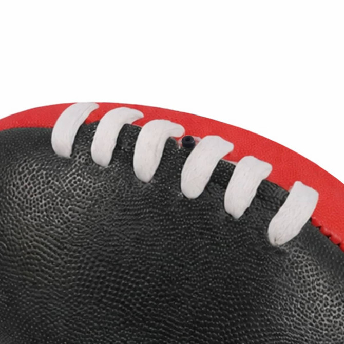 A Mini Aussie Rules Ball featuring a black and red design with white stitching detail.