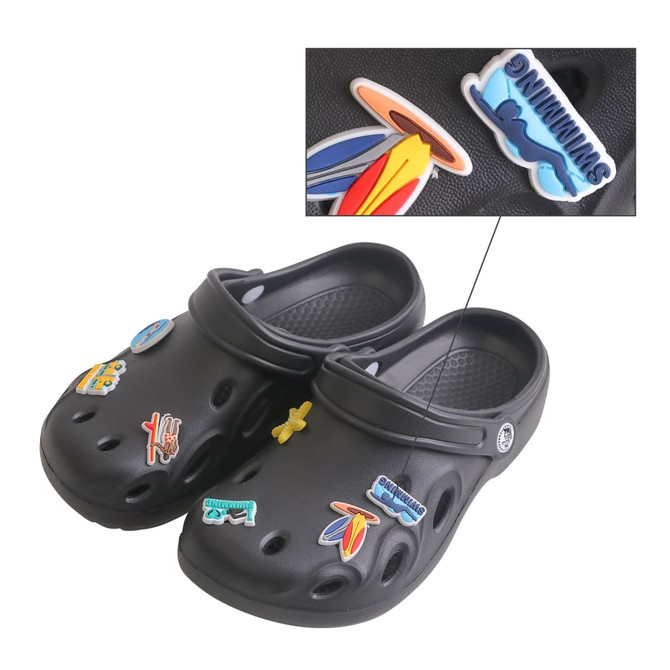 A pair of black Crocs adorned with colourful custom shoe charms. Features various fun designs.