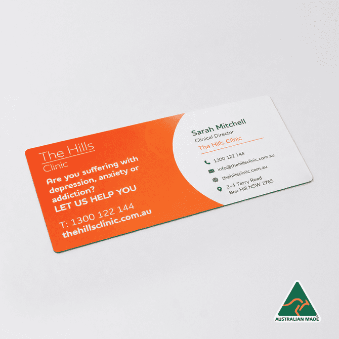 A rectangular, double-sided business card featuring orange and white colours, with contact details and a logo.