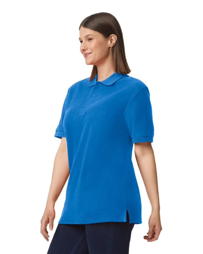 A blue Gildan Hammer adult double pique polo shirt displayed on a model, featuring short sleeves and a side slit.