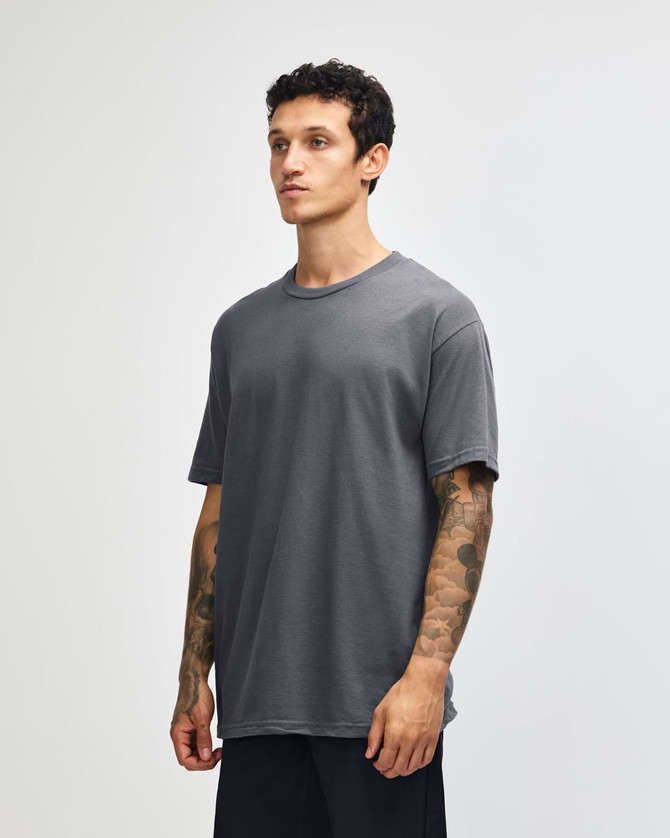 A heavyweight cotton unisex t-shirt in grey, featuring a round neckline and short sleeves, with a logo.