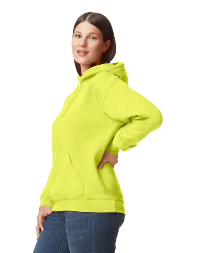 A bright yellow hooded sweatshirt with a front pocket and a logo, worn by a woman.