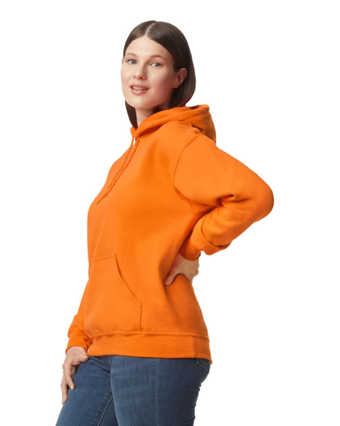 A woman is wearing an orange Gildan DryBlend adult hooded sweatshirt, featuring a front pocket and a hood.