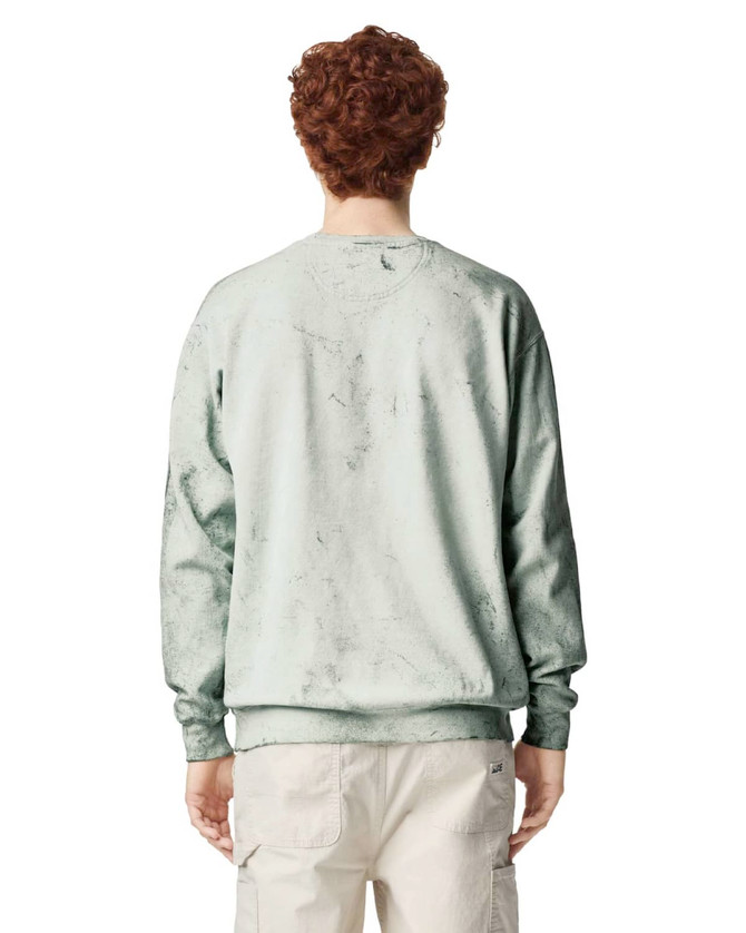 A crewneck sweatshirt in a soft green shade, featuring a textured design and a logo on the back.