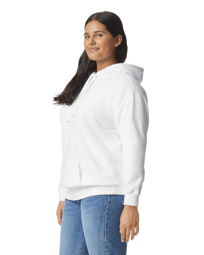 A white hooded sweatshirt with a front pocket and drawstrings, worn by a model, featuring a logo.