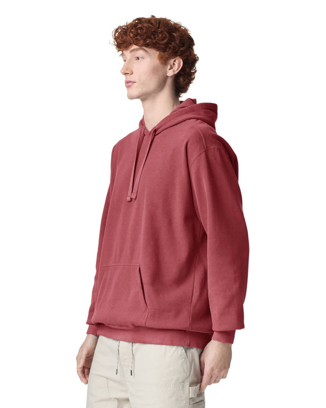 A maroon adult hooded sweatshirt with a front pocket and a drawstring hood, featuring a logo.