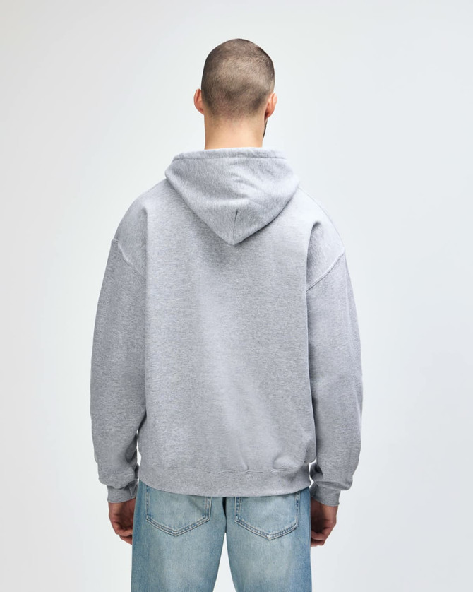 A grey Gildan Heavy Blend adult hooded sweatshirt with a large hood, viewed from the back.