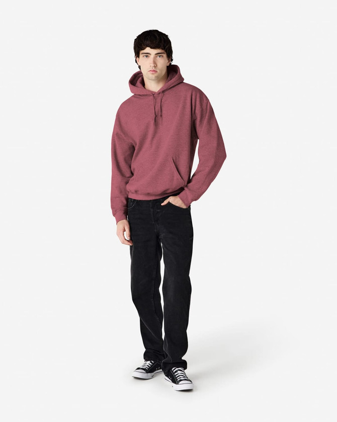 A maroon hooded sweatshirt is worn by a model paired with black jeans and sneakers, featuring a logo.