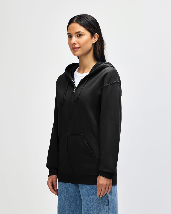 A black Gildan Heavy Blend adult full zip hooded sweatshirt on a model, featuring a front zipper and logo.