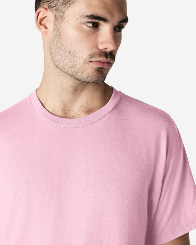 A pink Gildan Ultra Cotton adult T-shirt displayed on a model with a neutral background.