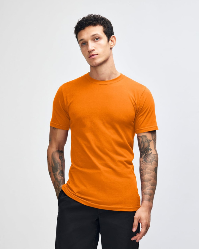 An orange unisex short sleeve t-shirt with a round neck and a branding logo.