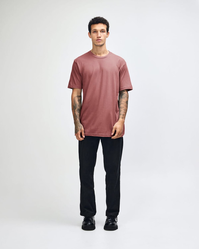 A unisex fine jersey short sleeve t-shirt in a dusty rose colour, featuring a simple design and a subtle logo.