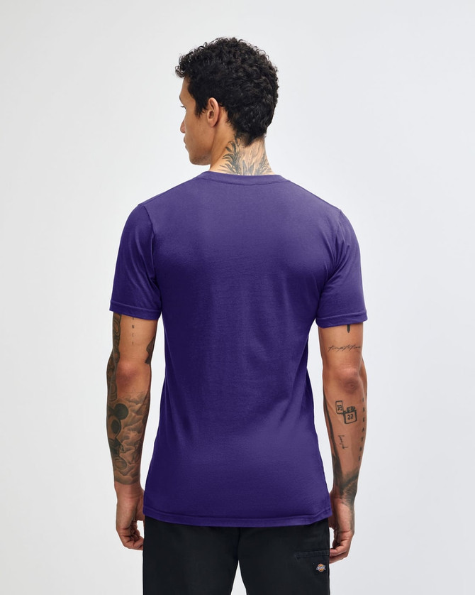 A purple unisex short sleeve t-shirt, featuring a logo, displayed from the back on a model.