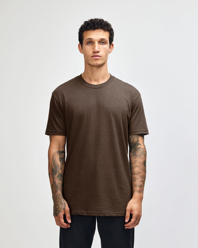 A unisex short sleeve t-shirt in brown, featuring a relaxed fit and a simple design. It has a branding logo.